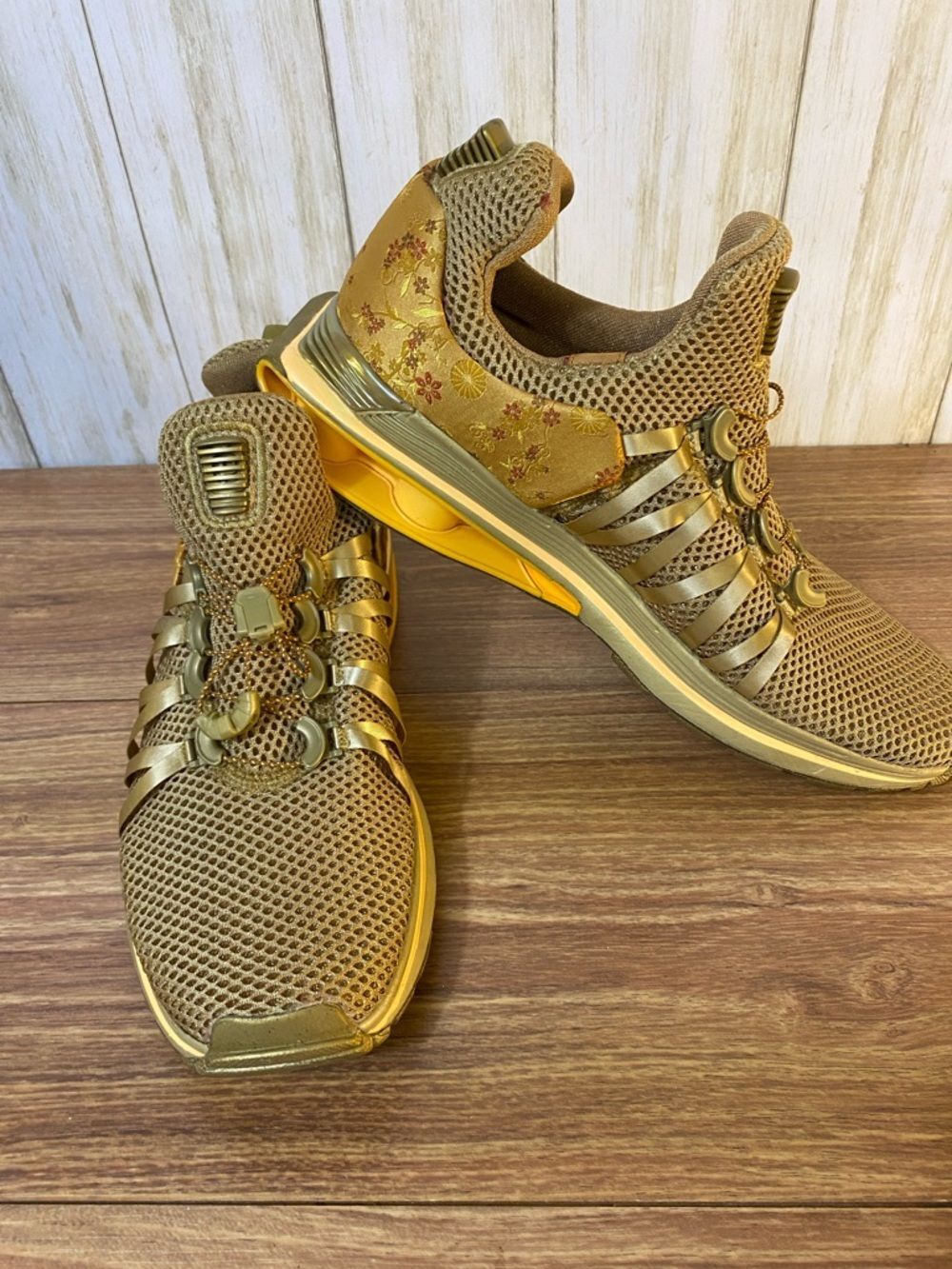 Nike Women's Metallic Gold Athletic Sneakers with Floral Accents Size 10